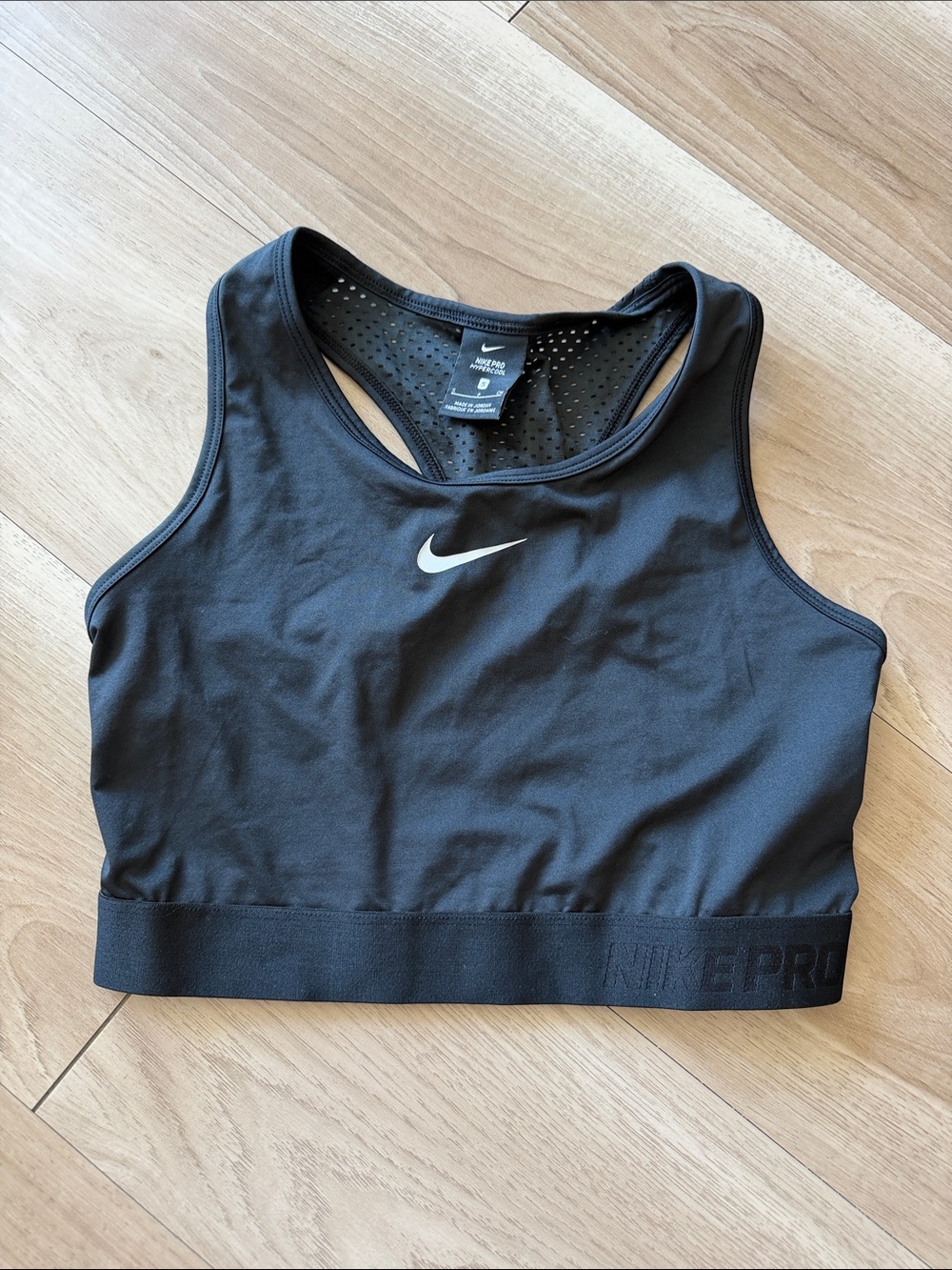 Nike Black Women's Racerback Sports Bra with White Swoosh